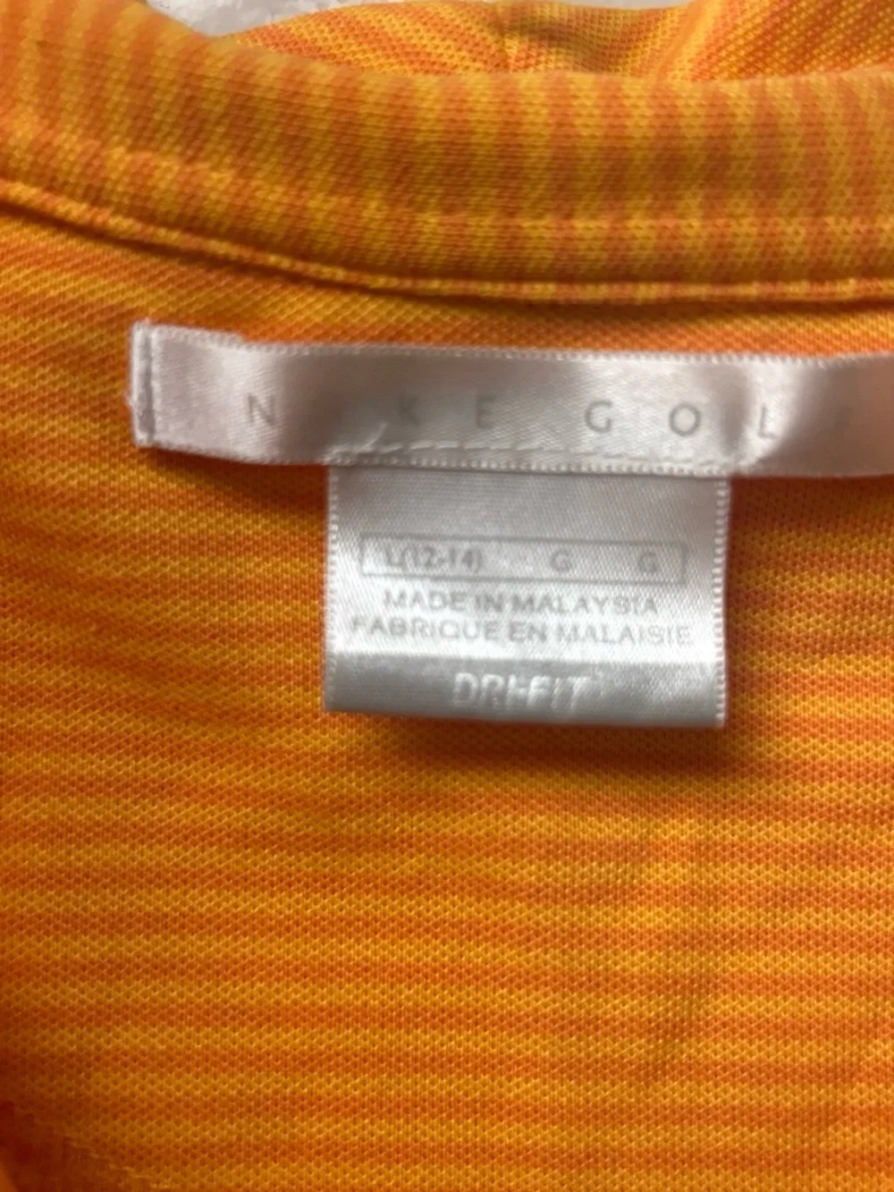 Nike Sleeveless Polo Tank Top in Orange